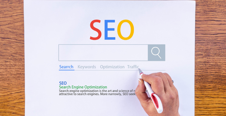 Search results page that says SEO at the top, and a hand with a pen pointing to a link that says TRAFFIC